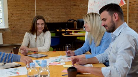 business team meeting involved diverse people participating in creative sustainable ideas steadicam shot across boardroom table shared work space