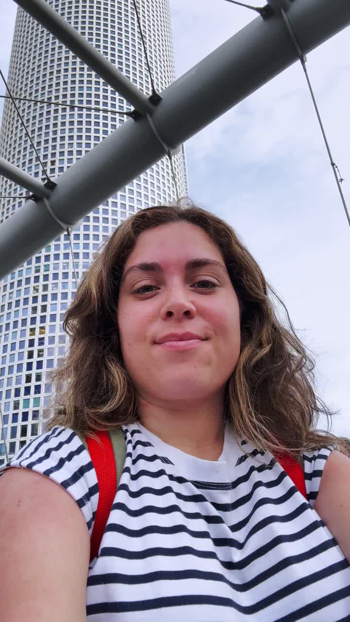 Woman Enjoys City View on Travel Day