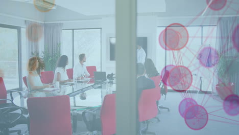 animation of network of connected icons with business colleagues at a presentation