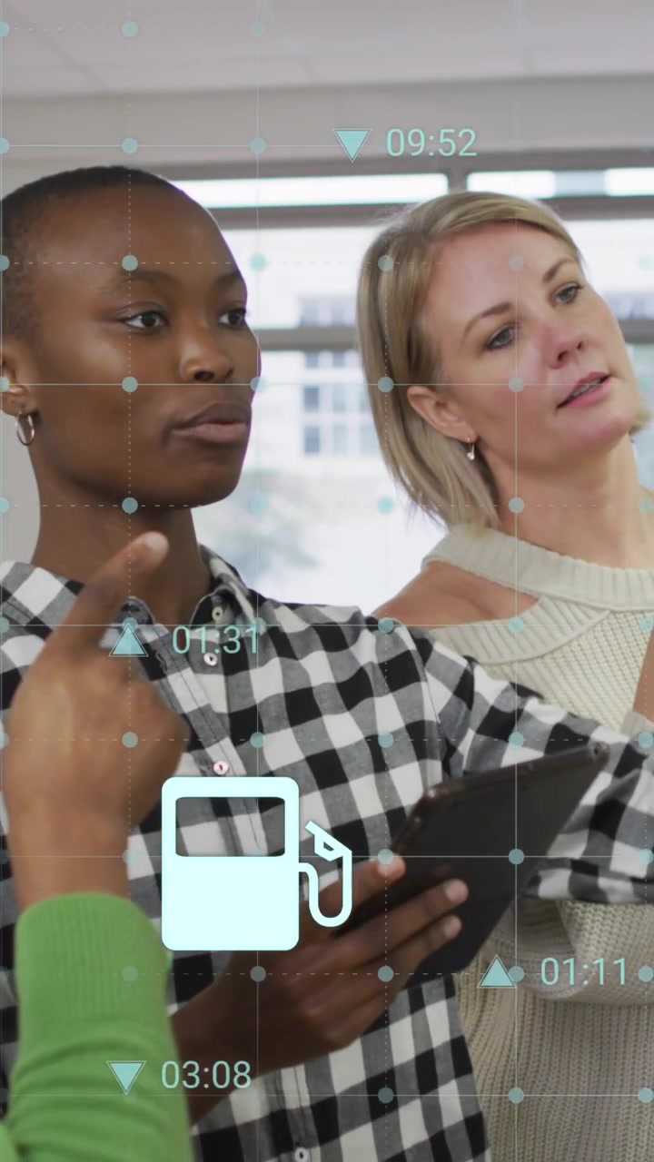 Animation of changing numbers, diverse female coworkers discussing and looking at sticky notes
