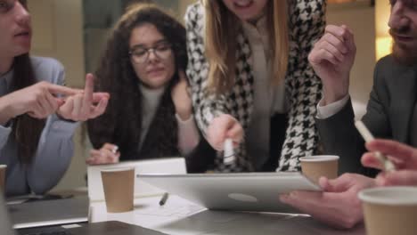 portrait of young business team at work. bright contemporary small creative business. casual young people in new creative business office or architects company