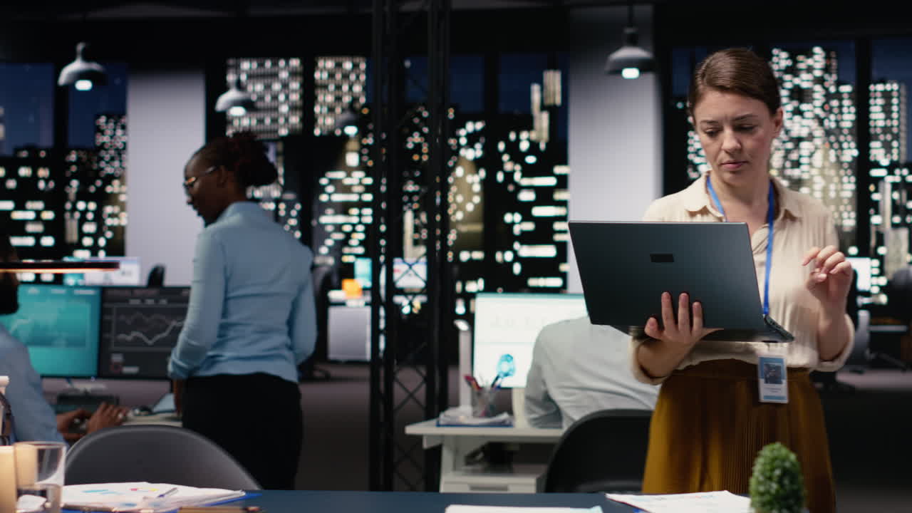 Evaluating operational efficiency, woman business administrator with laptop