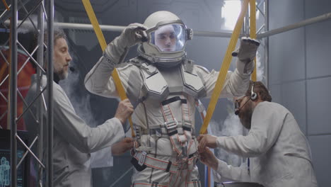 astronauts in space suit testing
