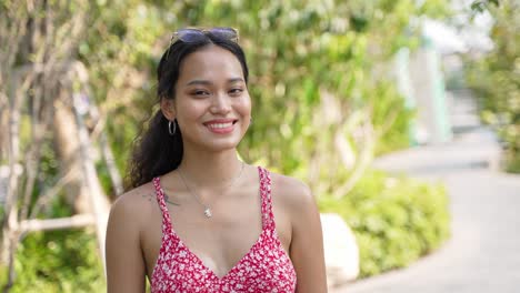 smiling woman in a park