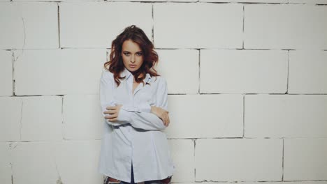 woman posing in studio. young fashion model girl posing in trendy wearing in studio