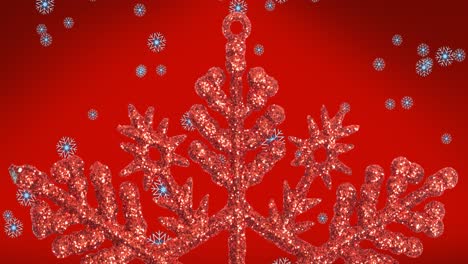 Animation-of-snow-falling-over-big-snowflake-on-red-background