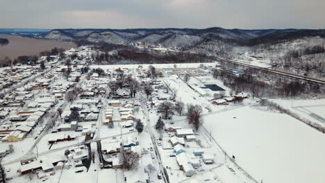 aerial view of snow covered ironton, ohio, the ohio river, and appalachians