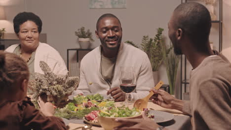 family celebrating with delicious dinner