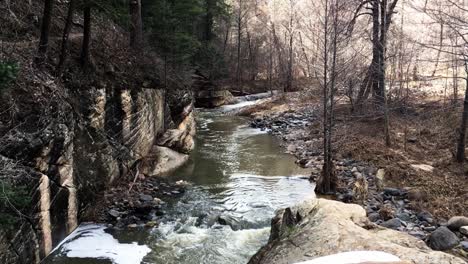 Winter-snow-runoff-from-the-mountains-of-Northern-Arizona-increase-the-flow-of-water-down-Oak-Creek,-Sedona,-Arizona