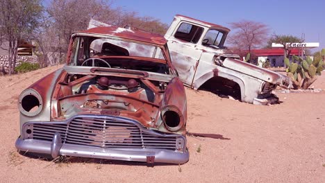 the tiny town of solitaire namibia offers a gas station and a small oasis surrounded by abandoned cars 4