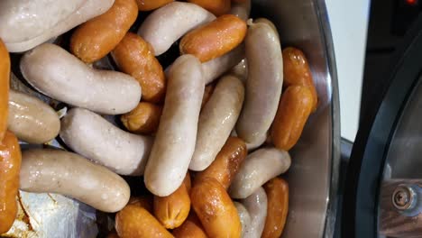 assorted cooked sausages