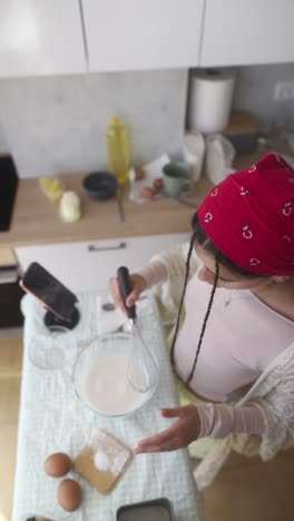 woman baking in kitchen