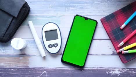 diabetes management supplies and mobile phone