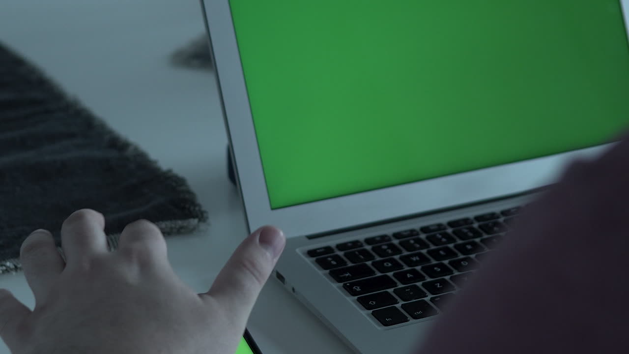 Close up on mobile phone and laptop screen, home office progress end work, turn off phone screen