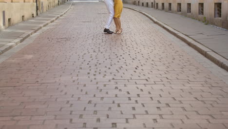 interracial couple dancing bachata in the old town street 10