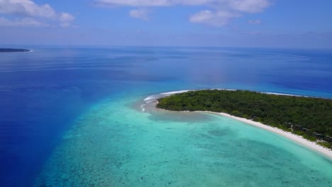 Panoramic-birds-view-of-tropical-sea-and-remote-island-shore