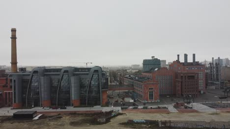 drone video of lodz fabryka, one of the landmarks of the city of lodz, poland on a cloudy day