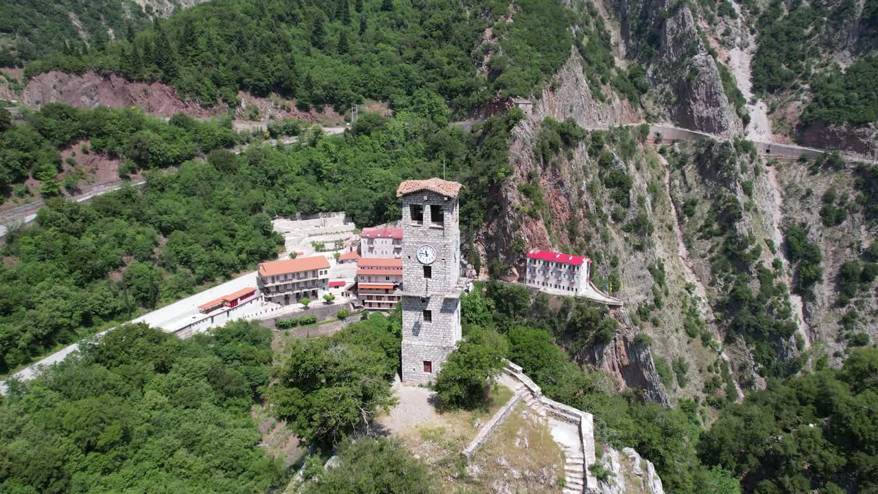 Prusos Monastery in Evritania Greece, Aerial Point of Interest Shot, Scenic View with Clock Tower in Foreground