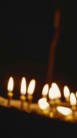 priest and candles