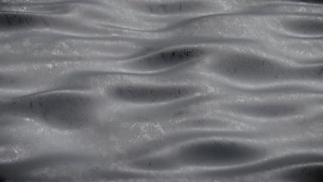 black smooth surface with ripples seamless loop 3d render animation