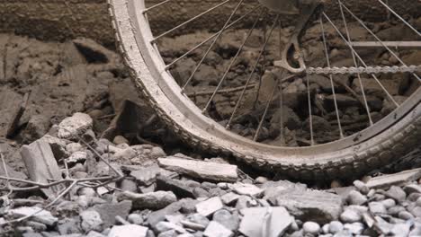 abandoned bike with flat tires left leaning on