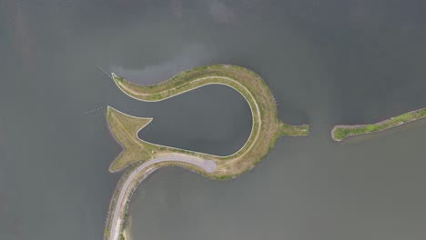 tulip island at zeewolde, flevoland, the netherlands. island in the wolderwijd, shaped in the form of a tulip. aerial video