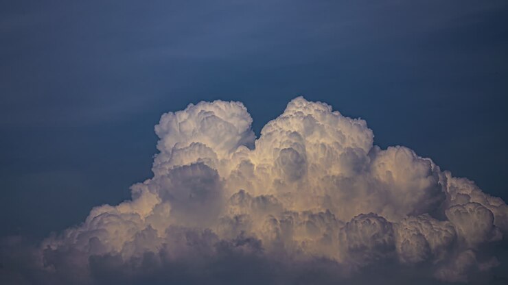 Process of white fluffy cloud formation, time lapse view