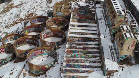 A-drone-shot-directly-overhead,-captures-the-water-and-leaching-tanks-of-the-Old-Tintic-Mill-in-Genola,-Utah,-built-in-the-1920s