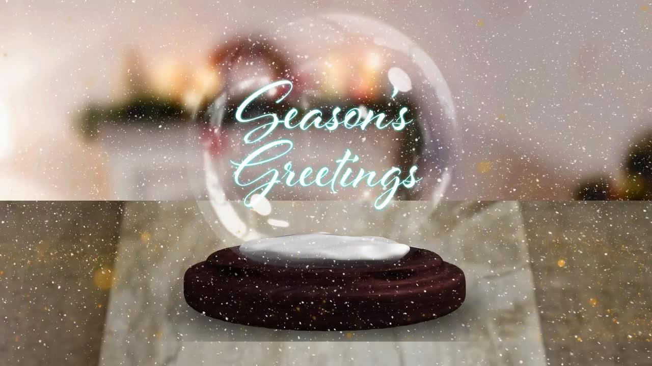 계절의 애니메이션 축하 문자 나무 테이블에 눈 글로브