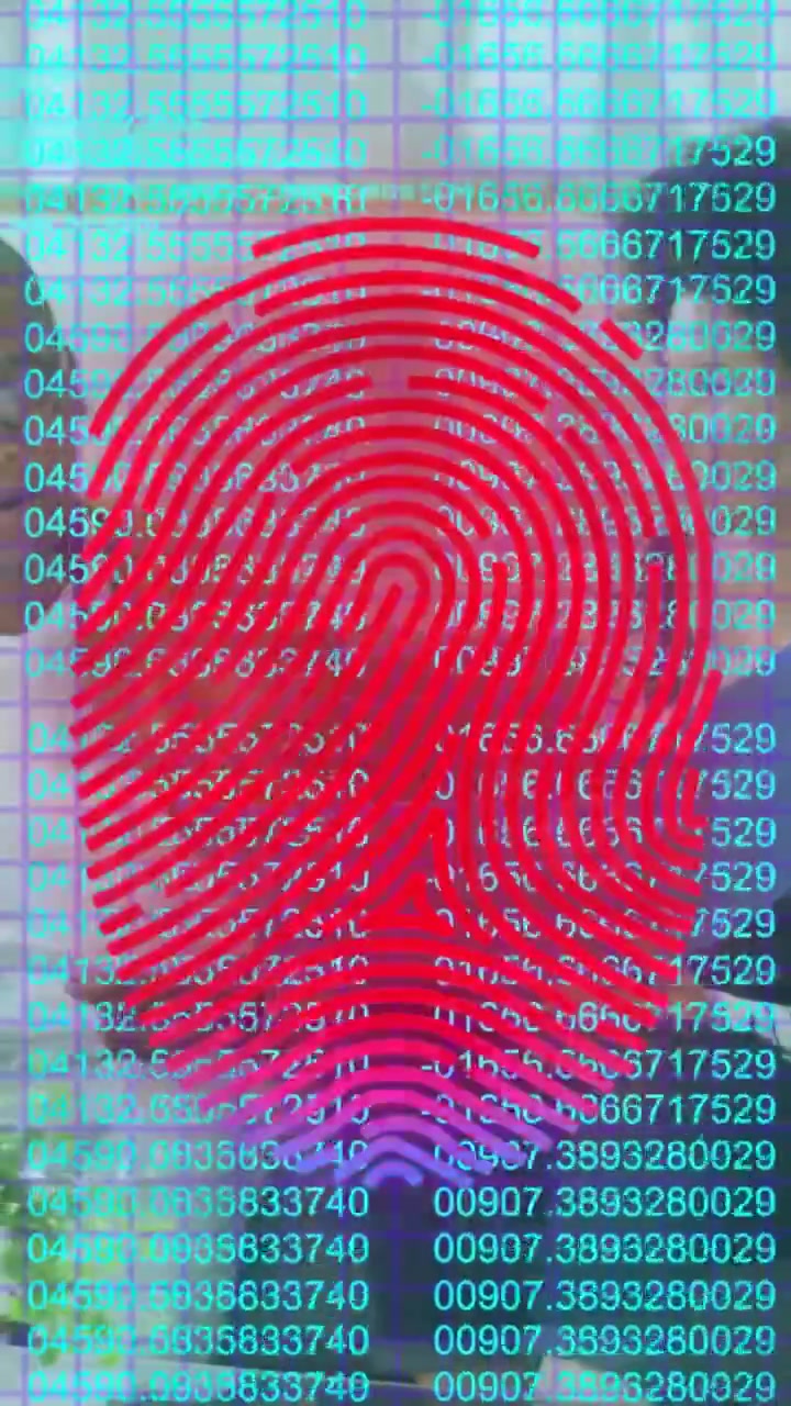 Vertical video: Woman by grid, cam starting fingerprint overlay data scrolling showing shape for ID