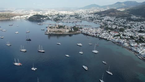 drone shot of bodrum town and castle on the turkish riviera