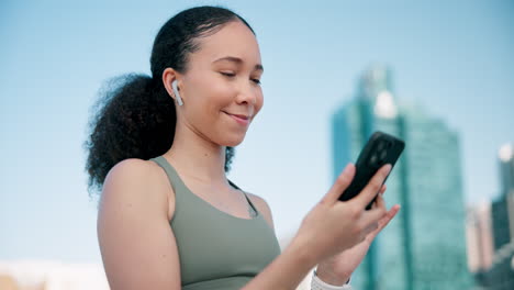 phone, sports and woman networking in the city