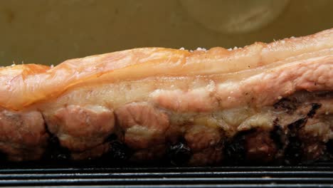 smoked grilled pork belly meat on grill barbecue