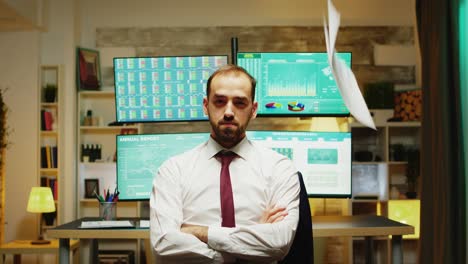 portrait of stock market broker looking serious at the camera