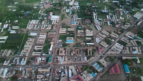 Wide-aerial-view-over-the-small-town-of-Kimana,-Kenya