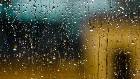 time lapse rain drops on a window glass. close up water texture