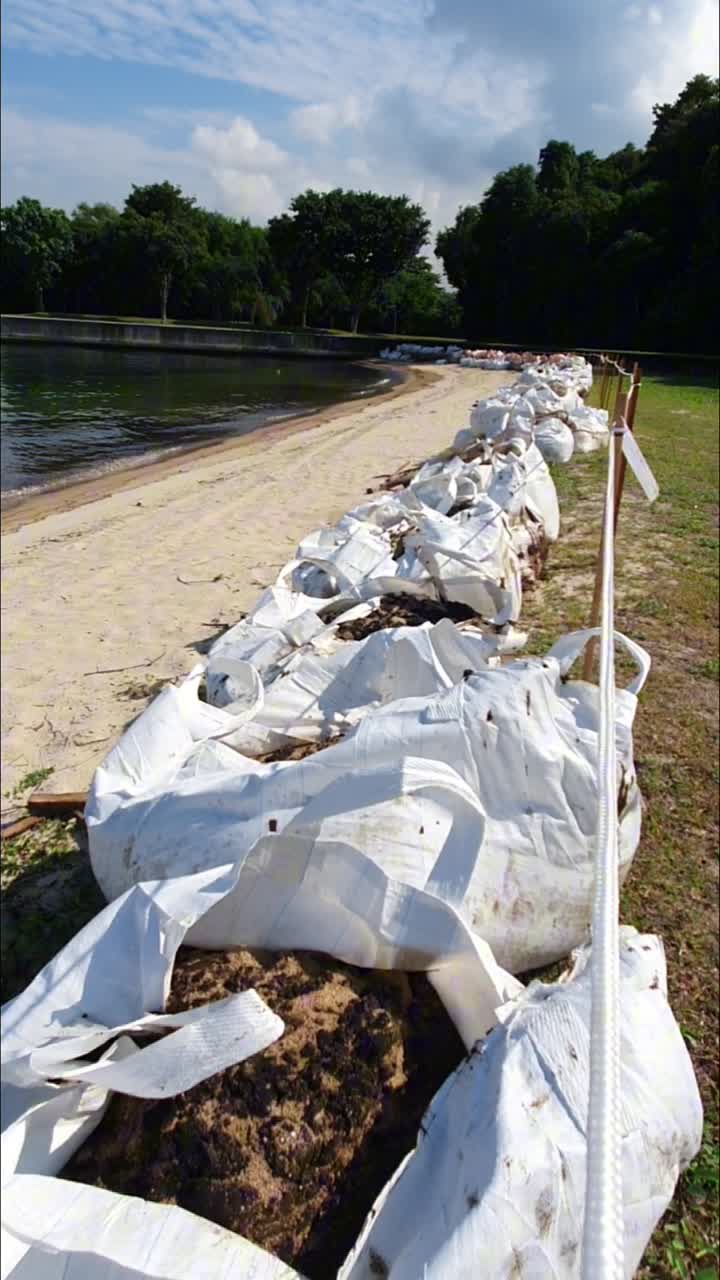 portrait footage of Lazarus Island , one of Singapore's southern islands cleaned up beach after an oil spill on 14th june 2024