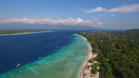 x2 speed aerial view drone flying over gili trawangan towards gili meno, bali, indonesia, holiday footage of tropical islands and beach