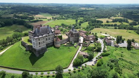 Panning-establishing-aerial-shot-Biron-castle-Chateau-de-Biron-France