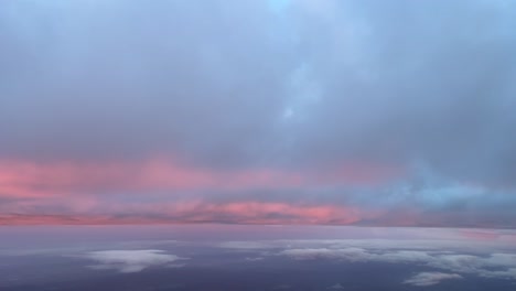 Aerial-jet-cockpit-view-while-flying-just-bellow-a-layer-of-winter-snow-clouds