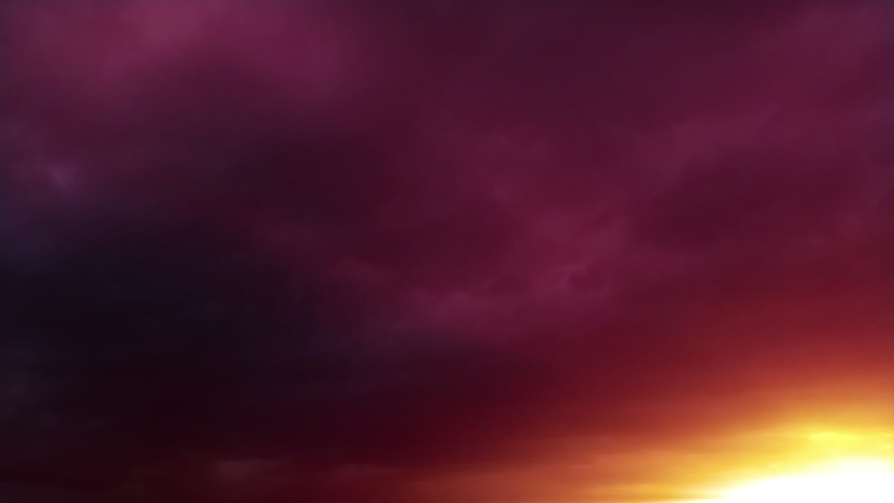 Colorful romantic sunset clouds backdrop moving - loop video