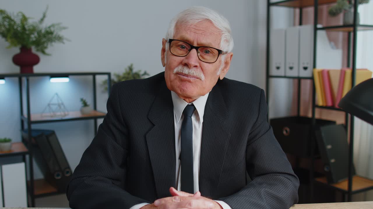 Senior business man director having interview job discussion video conference call at home office