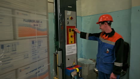 industrial worker operating machinery