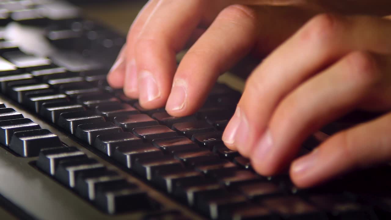 Close up of typing on a keyboard