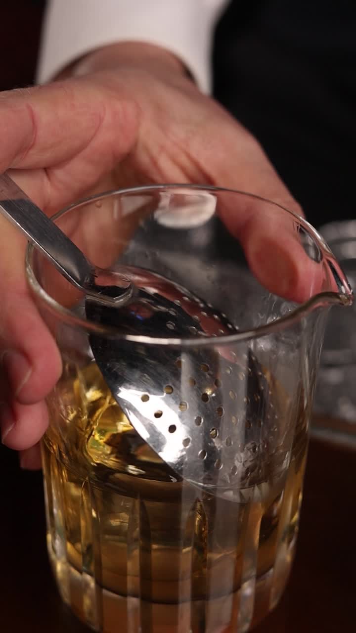 Bartender Preparing a Whiskey Cocktail