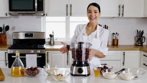 woman cooking with red dates in kitchen