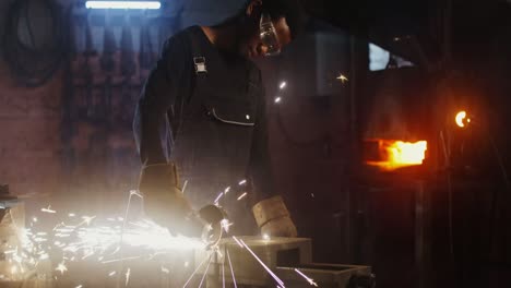 blacksmith at work in a forge