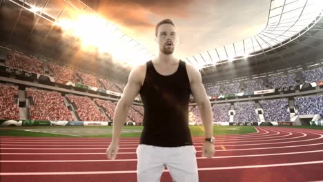 male athlete setting a smartwatch while warming up