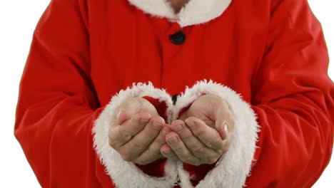 mid-section of santa claus with hands cupped