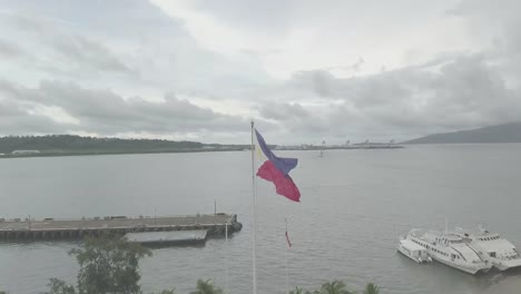 the philippine flag rotates smoothly, showcasing each side with vibrant colors and intricate designs, creating a dynamic display that highlights its symbolism and cultural significance.